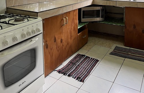 Avarua House | Modern spacious home - Mountain-side views, 10 minute walk to the beach.