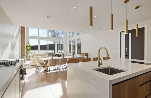 Woodridge Villa | Lakefront Paradise w/Pool, Hot Tub, Sauna & Kayaks