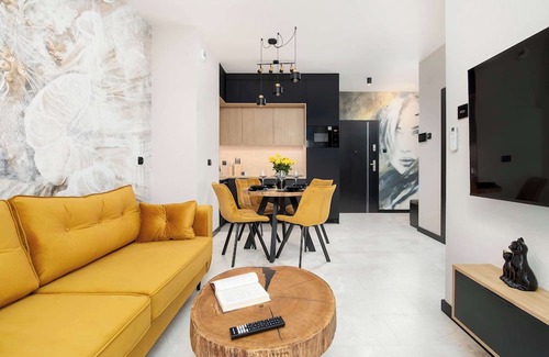 Rzeszow Apartment | Al. Kopisto 11 Rzeszów | Black and Yellow Apartment with Air Conditioned Living