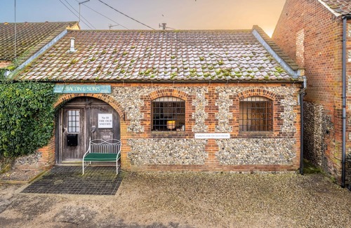 Walsingham Cottage | The Old Smithy in Great Walsingham still has the original sign over the door, and whilst packed with