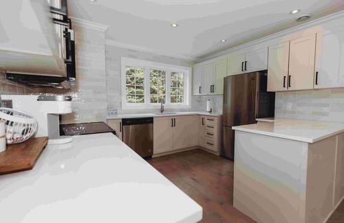 Humber Valley Ski Chalet | Luxurious Lakeside Chalet with Swim Spa
