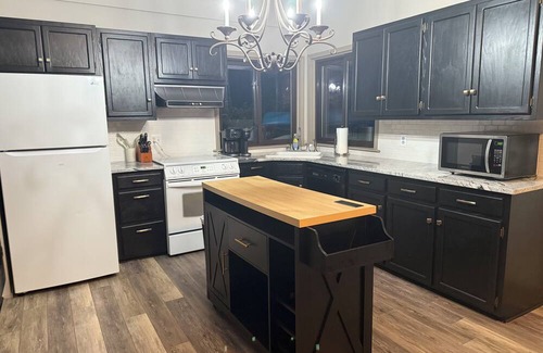 Commerce Township House | Lakeside 3 bedroom retreat with game room, hot tub and kayaks