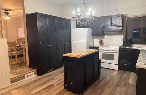 Commerce Township House | Lakeside 3 bedroom retreat with game room, hot tub and kayaks