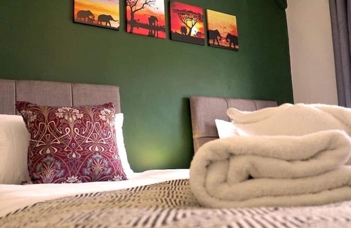 Port Talbot House | Parking, 4 Bedrooms, Small Courtyard