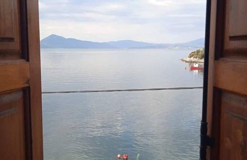 Trikeri House | Seaside Tower House: A Traditional Retreat with Breathtaking Views