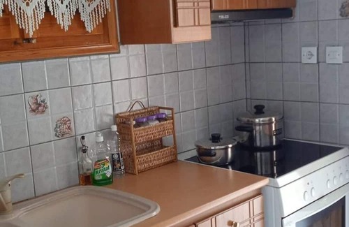 Trikeri House | Seaside Tower House: A Traditional Retreat with Breathtaking Views