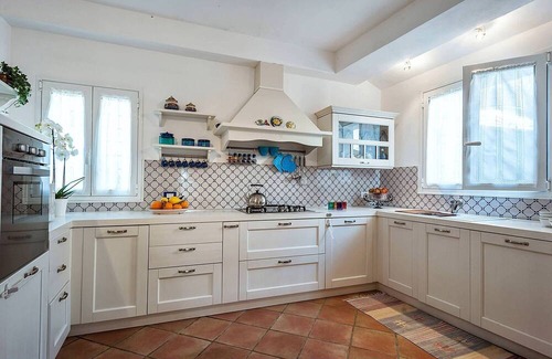 Marsala House | My Rental Homes - Casa Tika with shared pool surrounded by a wonderful garden
