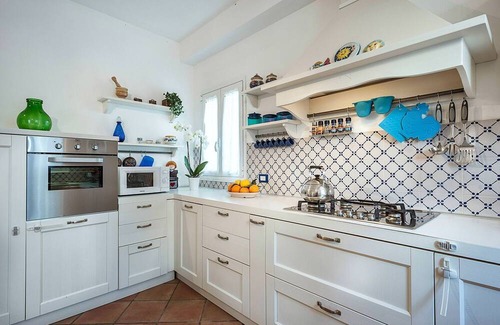 Marsala House | My Rental Homes - Casa Tika with shared pool surrounded by a wonderful garden