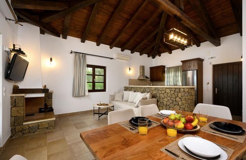 Kavvadades Villa | Dazzling Corfu Villa | Villa Emerald Horizon | 2 Bedrooms | Spacious Furnished Terrace with Shaded Outdoor Dining Area | Private Garden, Pool and Hot Tub | Prime Location | Arillas, Mega Lithari