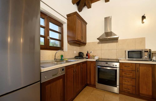 Kavvadades Villa | Dazzling Corfu Villa | Villa Emerald Horizon | 2 Bedrooms | Spacious Furnished Terrace with Shaded Outdoor Dining Area | Private Garden, Pool and Hot Tub | Prime Location | Arillas, Mega Lithari