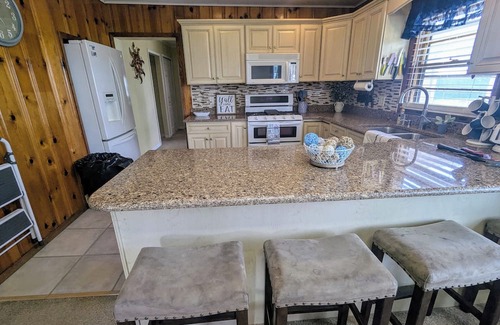 Bass Lake House | Cozy LakeView Cottage with a Touch of Modern Flair!