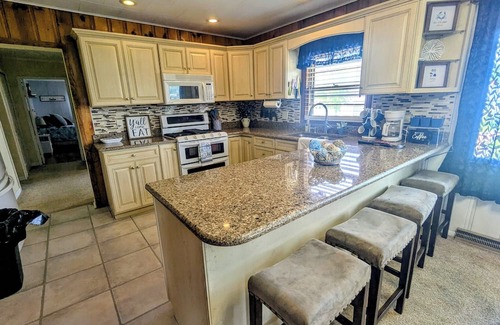 Bass Lake House | Cozy LakeView Cottage with a Touch of Modern Flair!