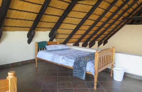Outjo House | Thatch Farm Stay @ BaseCamp Namibia