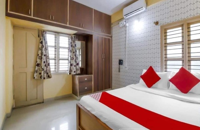 Spacious Bedroom hotel with AC and Free Wi-Fi in vibrant Bengaluru
