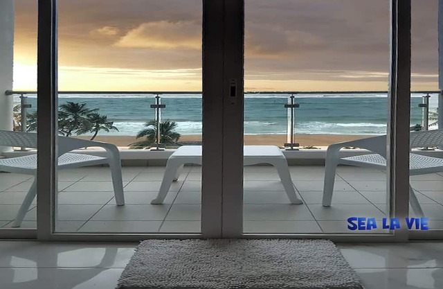 Enjoy a beautiful sunset from your ocean-view bedroom.