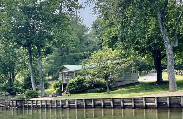 Relax at Pretty Point on Lake Hickory with amazing lake views throughout house!