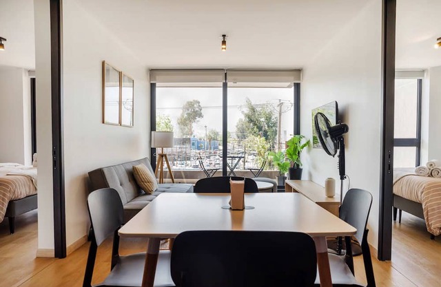 Chic 2BR Retreat for 5 in Vibrant Las Condes Oasis