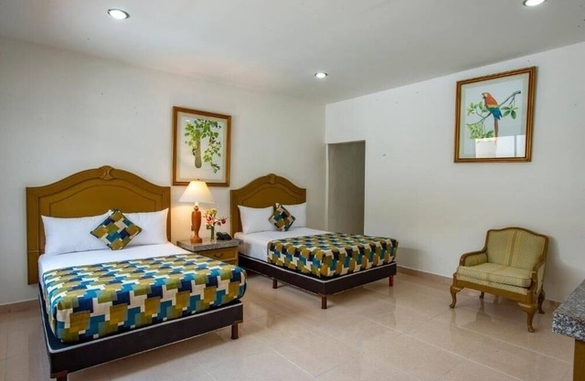 Double Room Poolside Mérida Getaway with Terrace, WiFi & Family-Friendly Comfort