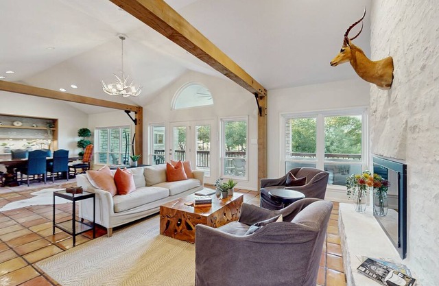 Spacious beautiful home w/full kitchen, balcony and patio, next to golf course