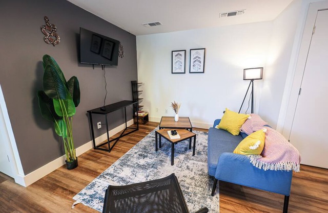 Imagine a stylish escape in Glenwood, the epitome of urban luxury