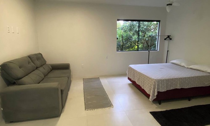Garopaba Apartment | Apartment with kitchen in Praia da Ferrugem/SC surrounded by nature