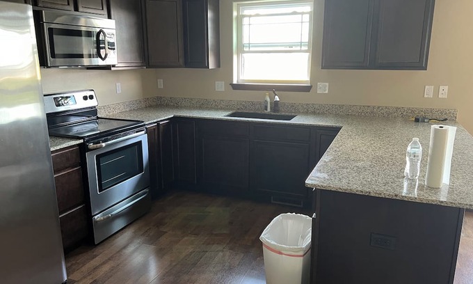 Marion Condo | Welcome to our serene 4-bed, 3.5 bath retreat in a quiet neighborhood in Marion.