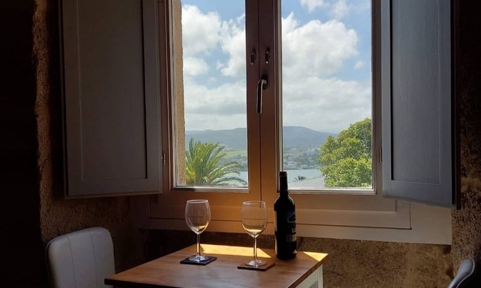 Figueras (Castropol) Apartment | Bright duplex, with beautiful views of the river.