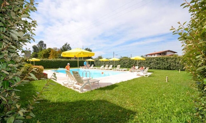 San Michele al Tagliamento Apartment | Relaxing escape in a green oasis by Beahost Rentals