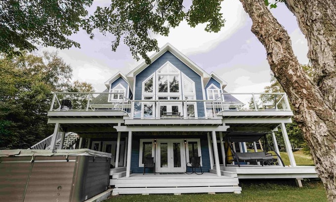 Humber Valley Ski Chalet | Luxurious Lakeside Chalet with Swim Spa