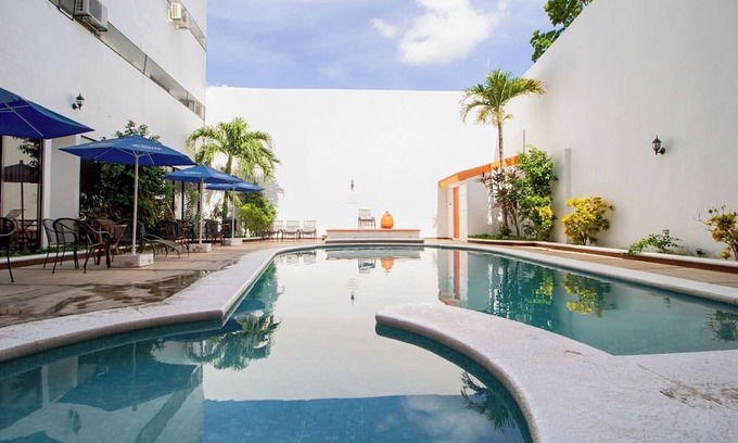 Merida Municipality Hotel | Colorful Mérida Stay with Pool, Garden Setting & Easy Walk to Parque Santiago