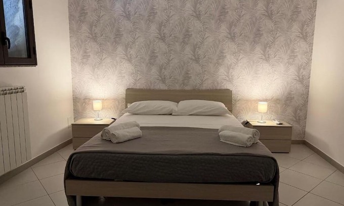 Caltagirone Apartment | An elegant retreat overlooking the city of mosaics